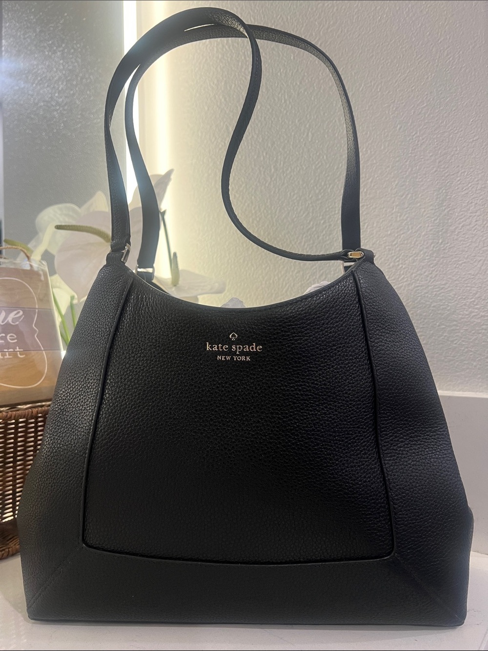 kate spade black pebbled leather shoulder bag with silver logo. NWOT